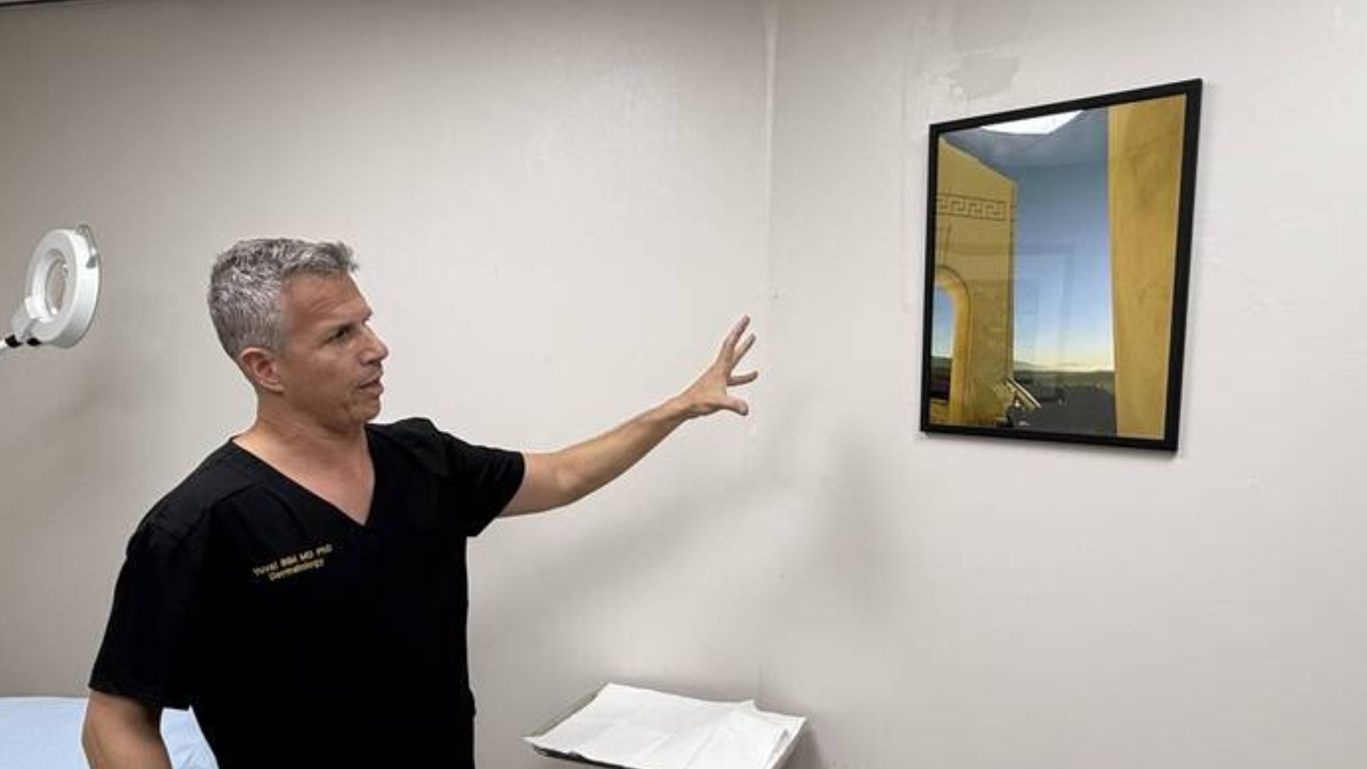 Coral Springs dermatologist transforms his skin clinic into a unique art gallery featuring snakeskin apples and surreal creations
