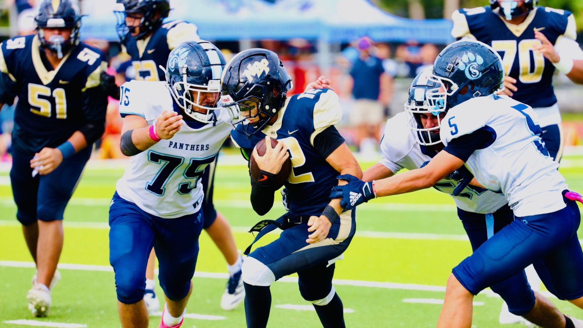Coral Glades leads before lightning stops play as four local football teams lose